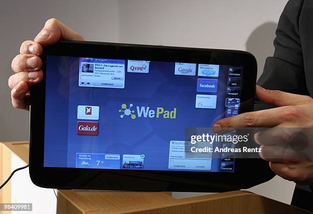 Man touches on a 'WePad' during the launch of the new 'WePad' - a mobile tablet browsing device on April 12, 2010 in Berlin, Germany. The soft-launch...