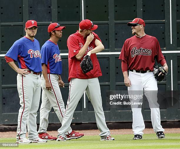 Brett Myers, right, of the Houston Astros chats with some of his old Philadelphia Phillie teammates at Minute Maid Park on April 9, 2010 in Houston,...