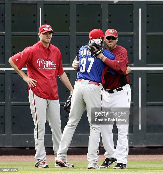 Brett Myers, right, of the Houston Astros chats with some of his old Philadelphia Phillie teammates at Minute Maid Park on April 9, 2010 in Houston,...
