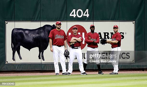 Felipe Paulino, Humberto Quintero, Sammy Gervacio and Wandy Rodiriguez, of the Houston Astros stand in center field during batting practice at Minute...