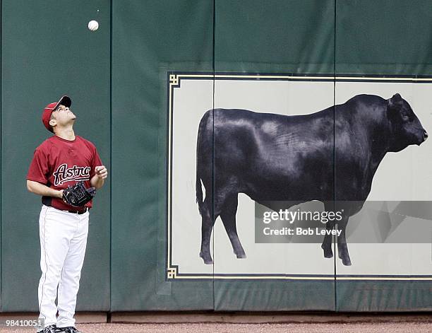 Pitcher Wandy Rodriguez of the Houston Astros tosses the ball in center field during batting practice at Minute Maid Park on April 9, 2010 in...