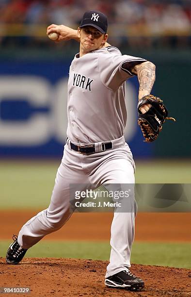 Pitcher A.J. Burnett of the New York Yankees pitches against the Tampa Bay Rays during the game at Tropicana Field on April 11, 2010 in St....