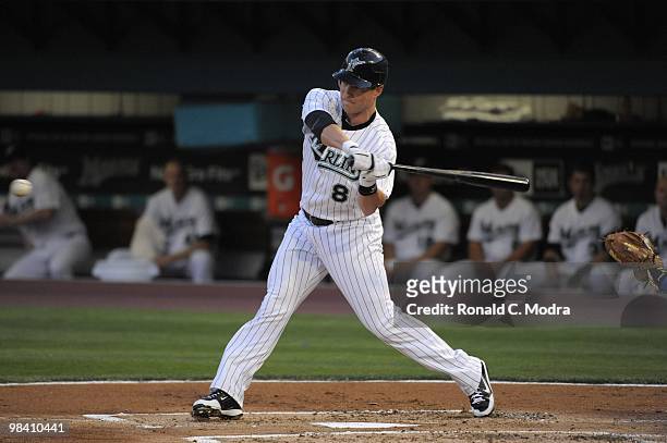 Chris Coghlan of the Florida Marlins bats against the Los Angeles Dodgers during the Marlins home MLB opening game at Sun Life Stadium on April 9,...