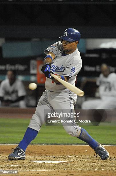 Rafael Furcal of the Los Angeles Dodgers bats against the Florida Marlins during the Marlins home MLB opening game at Sun Life Stadium on April 9,...