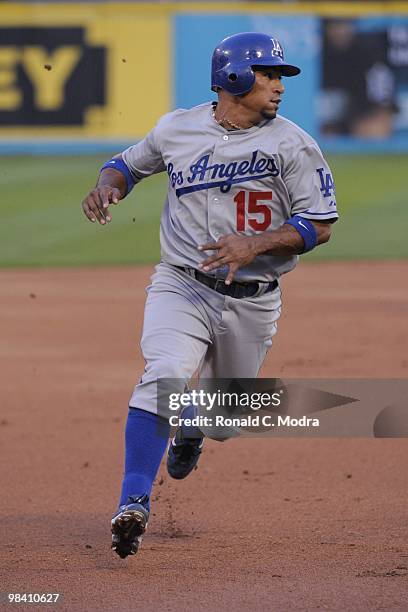 Rafael Furcal of the Los Angeles Dodgers runs to third base against the Florida Marlins during the Marlins home opening game at Sun Life Stadium on...