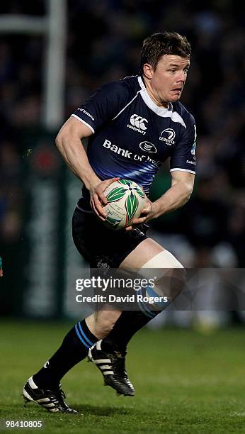 Brian O'Driscoll of Leinster runs with the ball during the Heineken Cup quarter final match between Leinster and Clermont Auvergne at the RDS on...