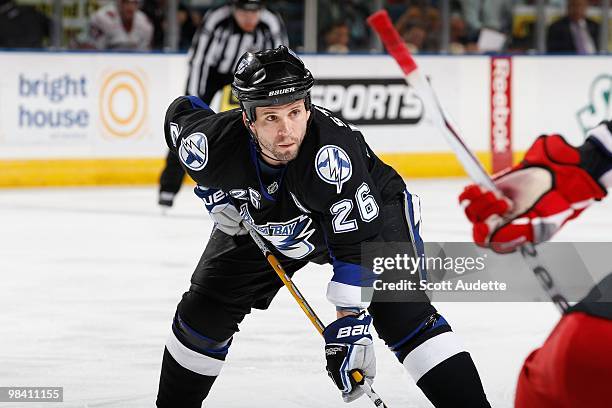 Martin St. Louis of the Tampa Bay Lightning prepares for the face-off against the Carolina Hurricanes at the St. Pete Times Forum on April 6, 2010 in...