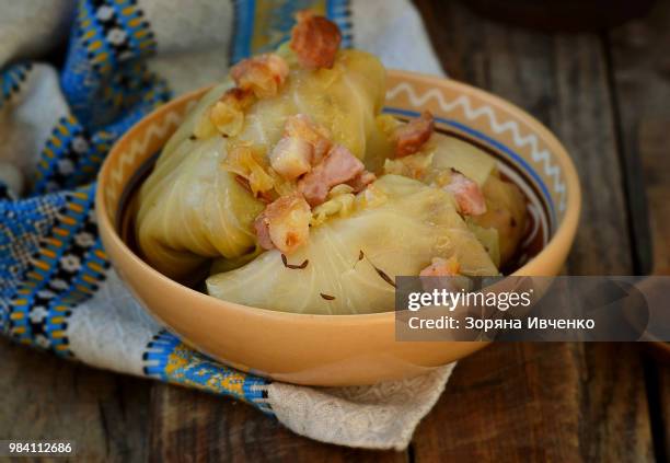cabbage rolls with fried bacon and onion - stuffed cabbage stock pictures, royalty-free photos & images