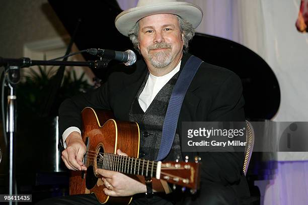 Musician/vocalist Robert Earl Keen performs at the Nobelity Project's dinner honoring Willie Nelson with the "Feed The Peace" award at the Four...