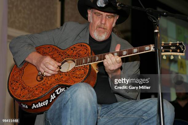 Musician/vocalist Ray Benson performs at the Nobelity Project's dinner honoring Willie Nelson with the "Feed The Peace" award at the Four Seasons...