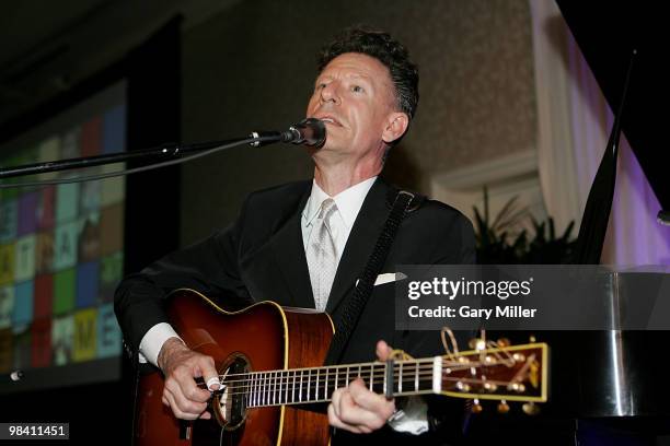 Musician/vocalist Lyle Lovett performs at the Nobelity Project's dinner honoring Willie Nelson with the "Feed The Peace" award at the Four Seasons...