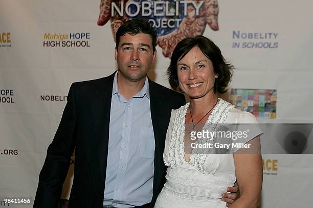 Actor Kyle Chandler and his wife Kathryn Chandler pose on the red carpet for the Nobelity Project's dinner honoring country music legend Willie...