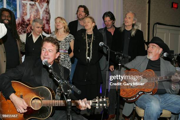 Musician/vocalistsJoe Ely and Ray Benson perform at the Nobelity Project's dinner honoring Willie Nelson with the "Feed The Peace" award at the Four...