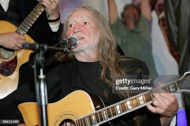 Willie Nelson performs at the Nobelity Project's dinner honoring him with the "Feed The Peace" award at the Four Seasons Hotel on April 11, 2010 in...