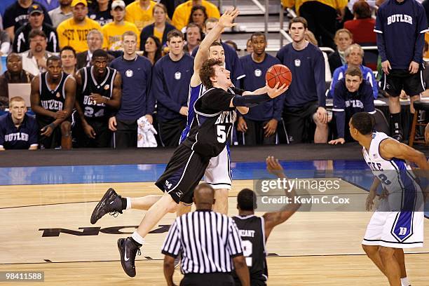 Matt Howard of the Butler Bulldogs drives for a shot attempt against the Duke Blue Devils during the 2010 NCAA Division I Men's Basketball National...