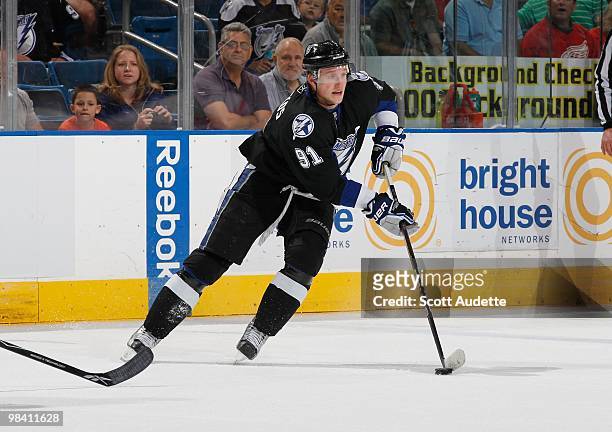 Steven Stamkos of the Tampa Bay Lightning controls the puck against the Carolina Hurricanes at the St. Pete Times Forum on April 6, 2010 in Tampa,...