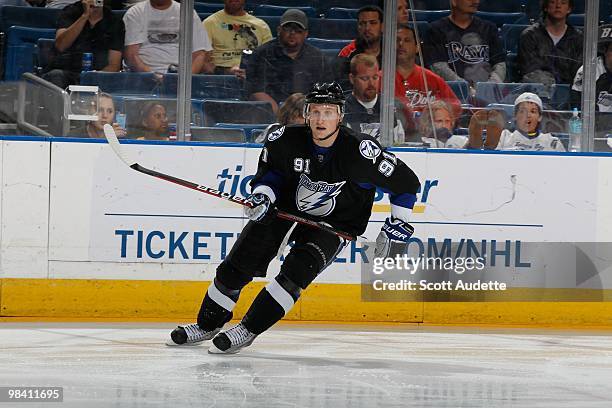 Steven Stamkos of the Tampa Bay Lightning skates to the puck against the Carolina Hurricanes at the St. Pete Times Forum on April 6, 2010 in Tampa,...