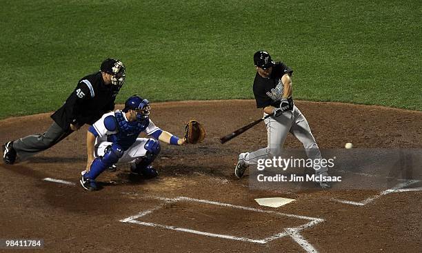 Dan Uggla of the Florida Marlins bats against the New York Mets on April 8, 2010 at Citi Field in the Flushing neighborhood of the Queens borough of...