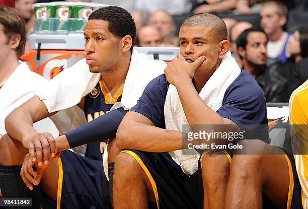 Danny Granger and Earl Watson of the Indiana Pacers look on from the bench during the game against the Los Angeles Lakers on March 2, 2010 at Staples...