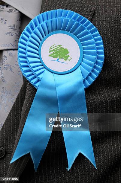 Detail view of a Conservative party rosette worn by a supporter in Loughborough's Market Place on April 12, 2010 in Loughborough, England. Mr Cameron...
