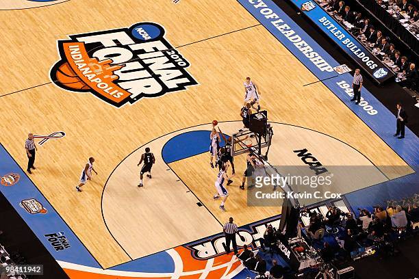 General view of Jon Scheyer of the Duke Blue Devils as he attempts a shot against the Butler Bulldogs during the 2010 NCAA Division I Men's...