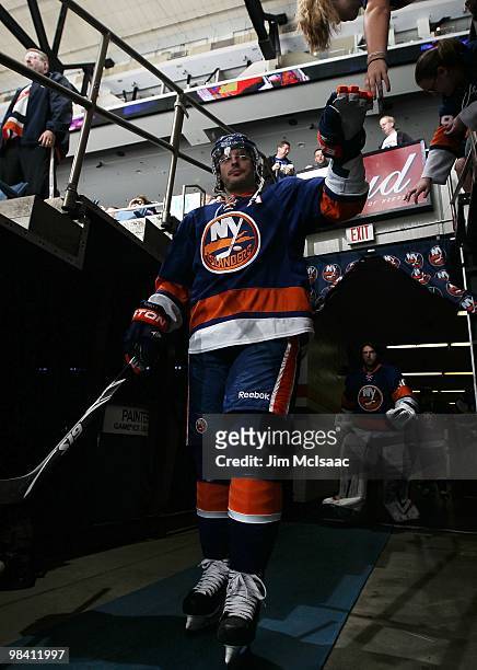 Mark Streit of the New York Islanders walks to the ice to play against the Ottawa Senators on April 3, 2010 at Nassau Coliseum in Uniondale, New York.