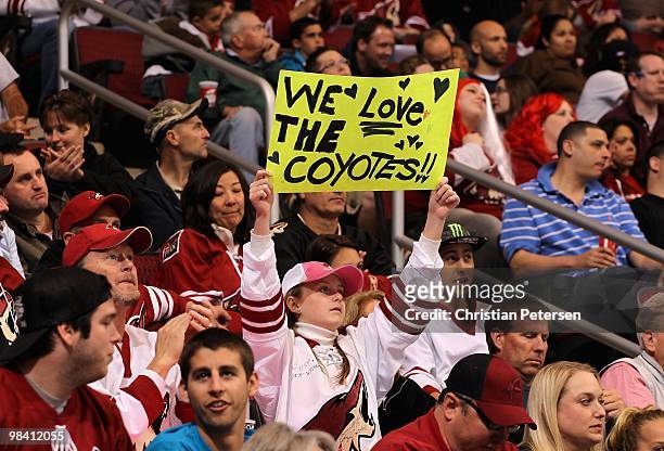 Fans of the Phoenix Coyotes hold up a sign during the NHL game against the Nashville Predators at Jobing.com Arena on April 7, 2010 in Glendale,...