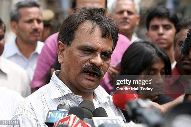 Malhotra speaks to the media after his visit to the site where Mayapuri's radioactive scrap was found in New Delhi on April 9, 2010. 6 people have...