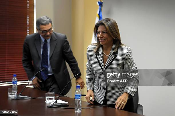 Costa Rican president elect Laura Chichilla gets ready for a press conference after meeting with Salvadorean President Mauricio Funes at the...