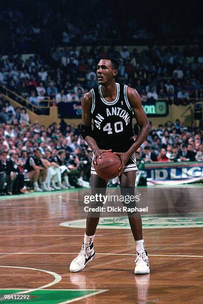 Willie Anderson of the San Antonio Spurs looks to make a play against the Boston Celtics during a game played in 1989 at the Boston Garden in Boston,...