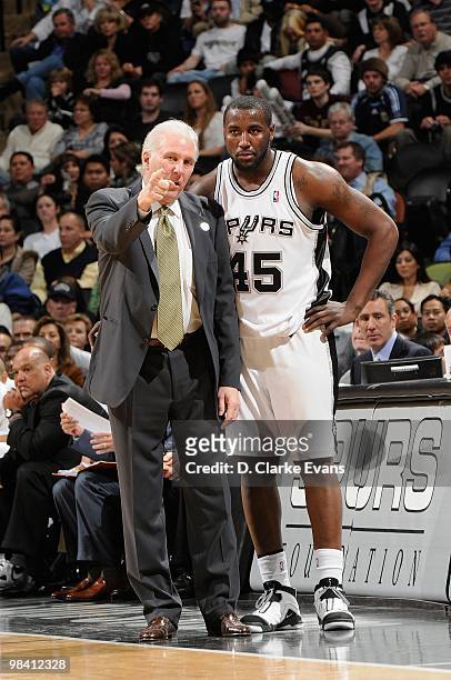 DeJuan Blair of the San Antonio Spurs listens to his head coach Gregg Popovich during the game against the New Orleans Hornets on March 5, 2010 at...