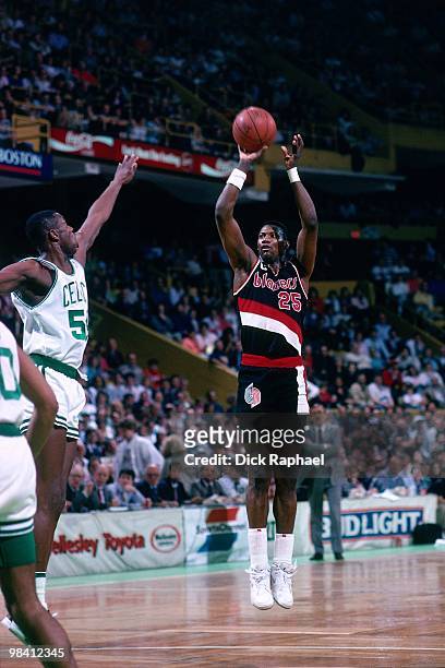 Jerome Kersey of the Portland Trail Blazers shoots a jump shot against the Boston Celtics during a game played in 1989 at the Boston Garden in...