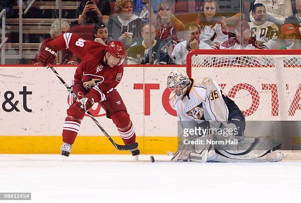 Vernon Fiddler of the Phoenix Coyotes tries to put the puck past Goaltender Pekka Rinne of the Nashville Predators on April 7, 2010 at Jobing.com...