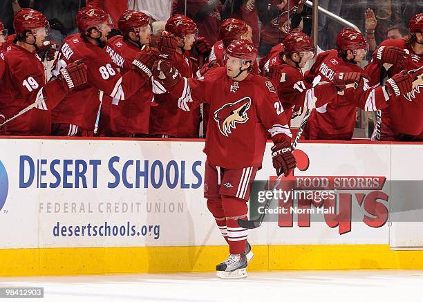 Lee Stempniak of the Phoenix Coyotes celebrates a goal against the Nashville Predators with teammates on the bench on April 7, 2010 at Jobing.com...