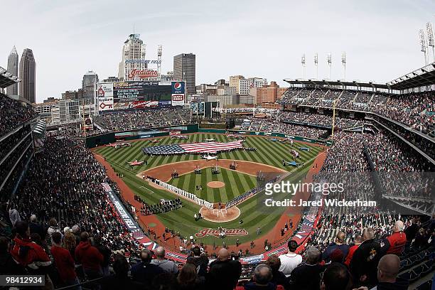 General view during the singing of the national anthem before the game between the Texas Rangers and the Cleveland Indians during the Opening Day...