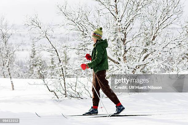 woman skiing sweden. - jamtland stock pictures, royalty-free photos & images