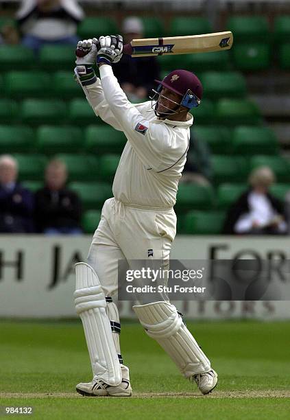 Marcus Trescothick of Somerset straight drives Robert Croft for six during the third day of the County Championship Division One match between...