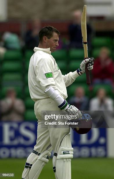 Marcus Trescothick of Somerset acknowledges the applause from the crowd after reaching his century during the third day of the County Championship...