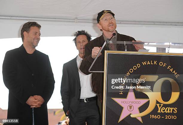 Actor Russell Crowe, producer Brian Grazer, and producer Ron Howard pose while Russell Crowe is honored on the Hollywood Walk Of Fame on April 12,...