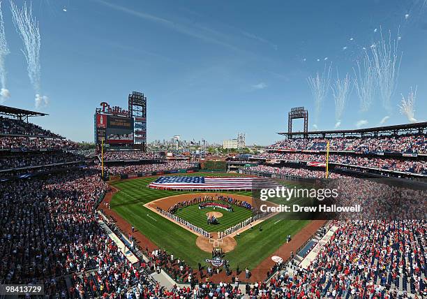 Fireworks are launched during the National Anthem before the game between the Philadelphia Phillies and Washington Nationals on Opening Day at...