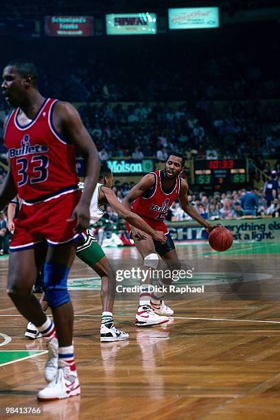 Darrell Walker of the Washington Bullets looks to make a move againt the Boston Celtics during a game played in 1989 at the Boston Garden in Boston,...