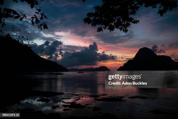 el nido sunset - nido stock pictures, royalty-free photos & images