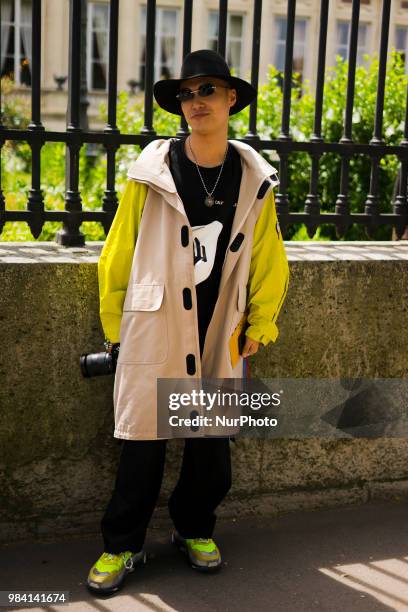 Guest is seen during Paris Men's Fashion Week Spring/Summer 2019 - Day 5, in Paris, France, on June 25, 2018.