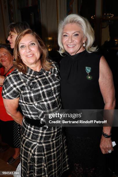 Marie-Yvonne Douste-Blazy and Elisabeth Dauchy, decorated "Officier des Arts et des Lettres" attend Decorations are given at "Ministere de La...