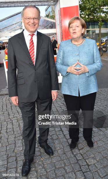 Stephan Weil and German Federal Chancellor Angela Merkel during the LV Lower Saxony Summer Party on June 25, 2018 in Berlin, Germany.