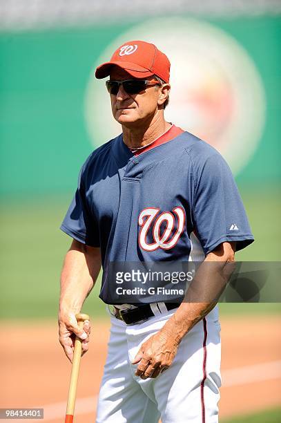 Manager Jim Riggleman of the Washington Nationals watches batting practice before the game against the Philadelphia Phillies at Nationals Park on...