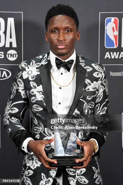 Victor Oladipo, winner of the NBA Most Improved Player award, poses in the backstage photo room during the 2018 NBA Awards Show at Barker Hangar on...