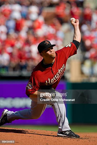 Starting pitcher Wandy Rodriguez the Houston Astros throws against the St. Louis Cardinals in the home opener at Busch Stadium on April 12, 2010 in...