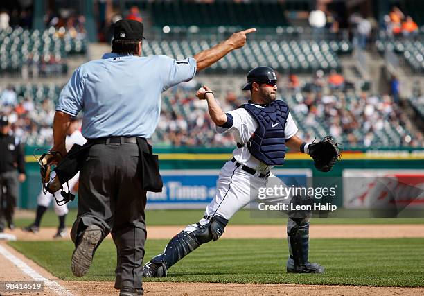 Alex Avila of the Detroit Tigers fields a bunt off the bat of Rick Ankiel of the Kansas City in the sixth inning during the game on April 12, 2010 at...