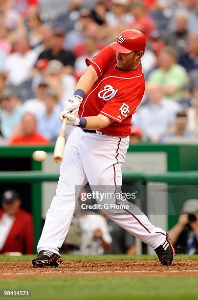 Adam Dunn of the Washington Nationals bats against the Philadelphia Phillies at Nationals Park on April 8, 2010 in Washington, DC.